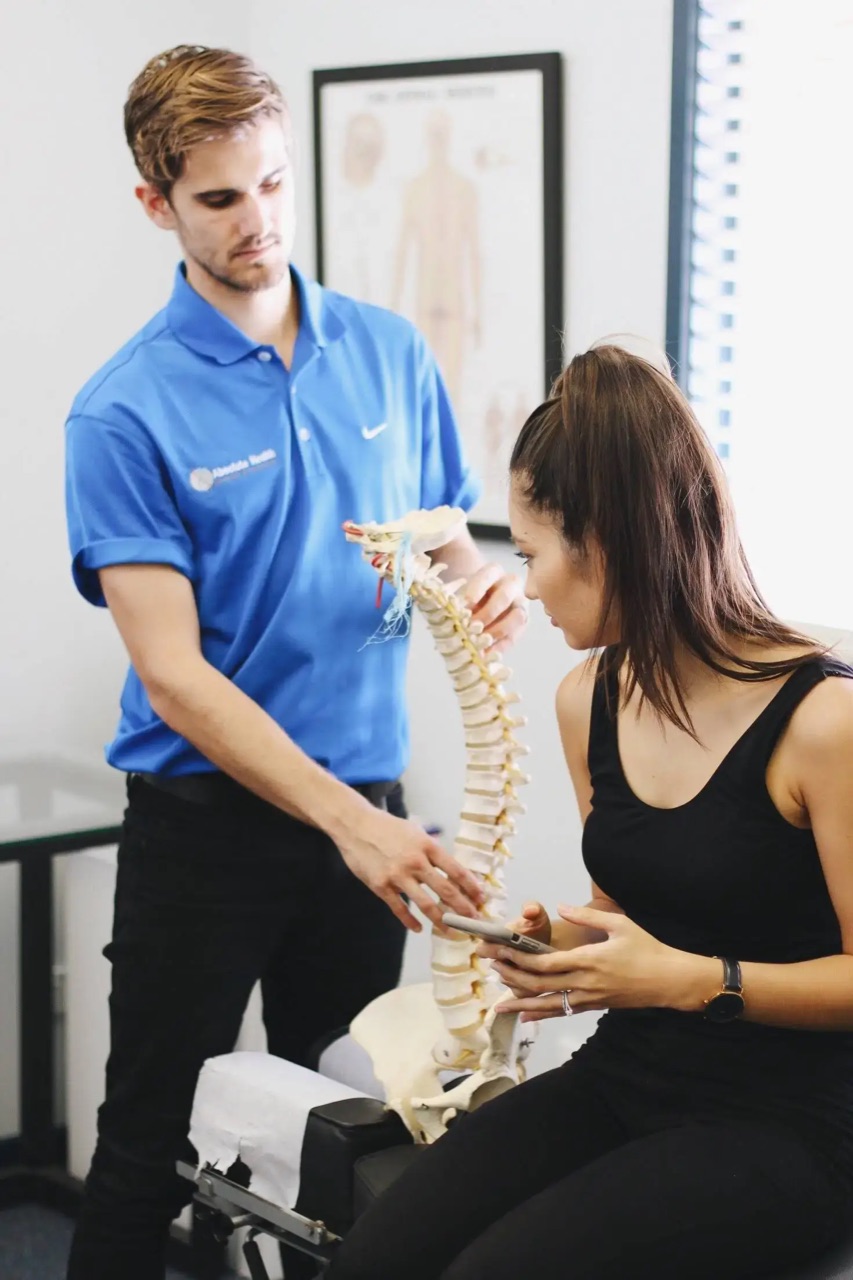 Practitioner answering a patient's questions at Absolute Health Sunshine Coast