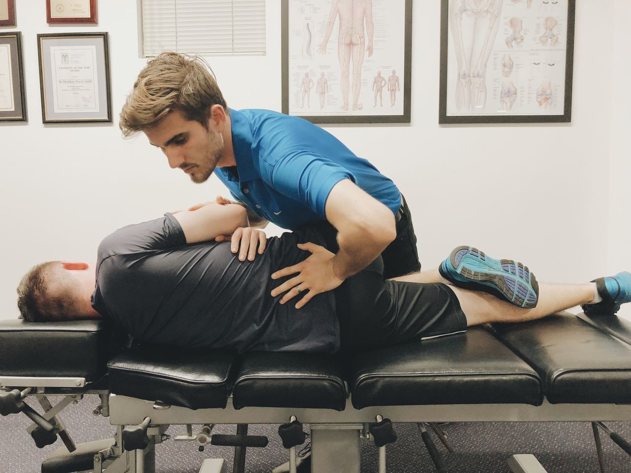 Physiotherapist treating thoracic spine and shoulder pain at Absolute Health Mooloolaba
